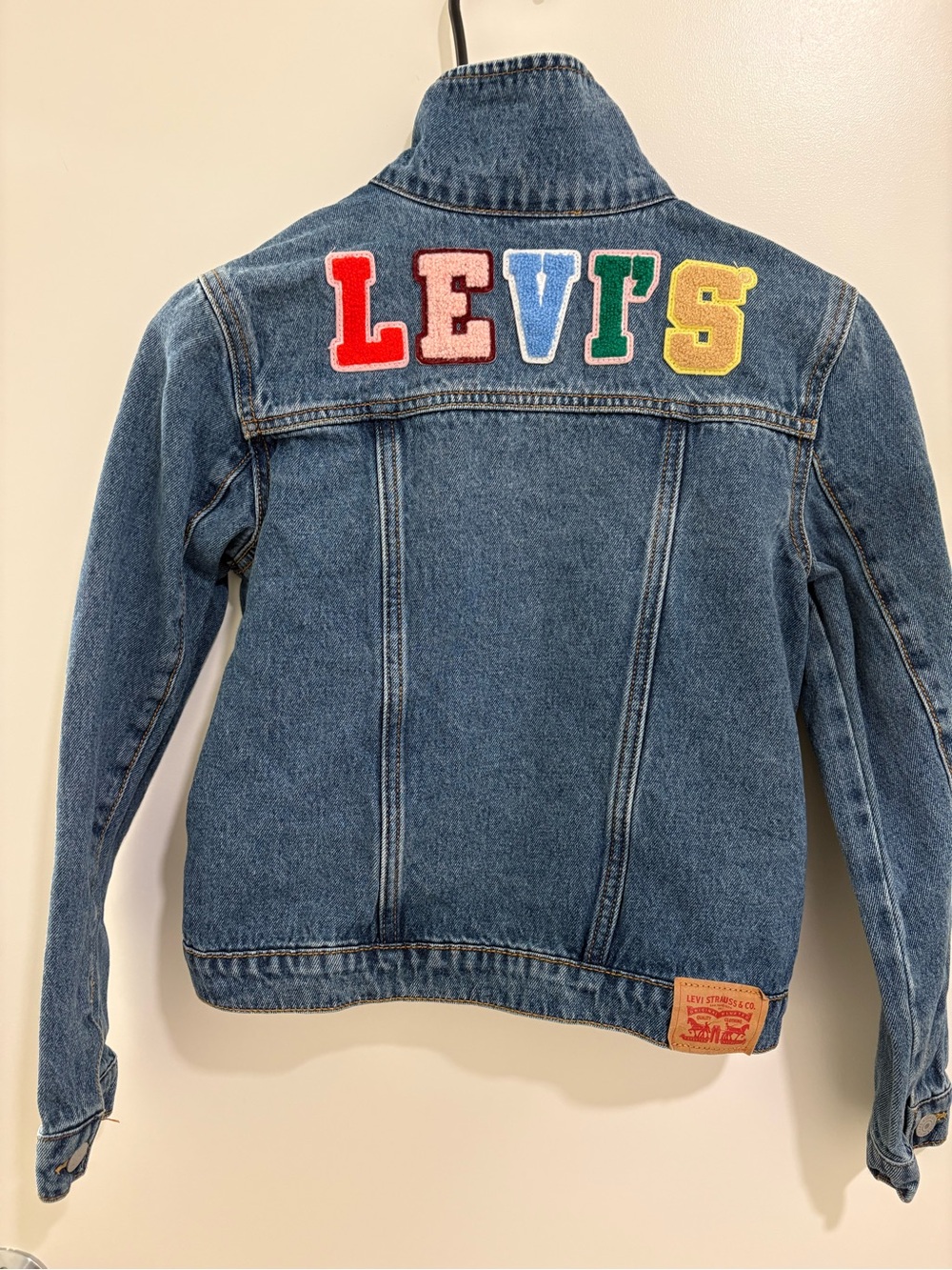 Levi's Blue Denim Jacket with Red Pink Blue Green Yellow Lettering